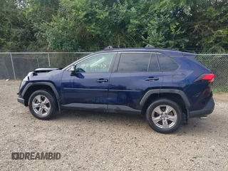2022 Toyota RAV4 XLE with VIN 2T3P1RFV5NW259010, listed as a IAAI auction lot 42707037 with 60,955 mi miles and . Bid and sale history available at DreamBid. Image 14.