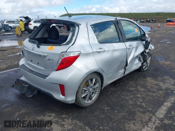 2014 Toyota Yaris L with VIN JTDKTUD33ED582669, listed as a IAAI auction lot 41573696 with Not Provided miles and . Bid and sale history available at DreamBid. Image 4.