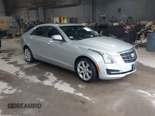 2016 Cadillac ATS Standard AWD z VIN 1G6AG5RX6G0149829, wystawiony jako IAAI lot #42165534 z przebiegiem 40 996 mil mil oraz . Historia ofert i sprzedaży dostępna na DreamBid. Obrazek 1.