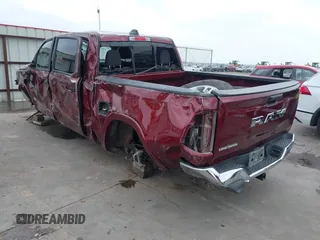 2025 Ram 1500 Big Horn with VIN 1C6RREFG5SN597979, listed as a IAAI auction lot 41931498 with 24,567 mi miles and . Bid and sale history available at DreamBid. Image 3.