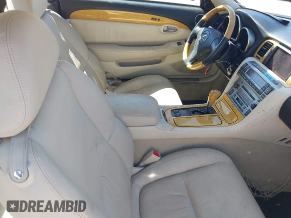2002 Lexus SC 430 z VIN JTHFN48Y520012854, wystawiony jako IAAI lot #40255538 z przebiegiem 109 360 mil mil oraz . Historia ofert i sprzedaży dostępna na DreamBid. Obrazek 5.