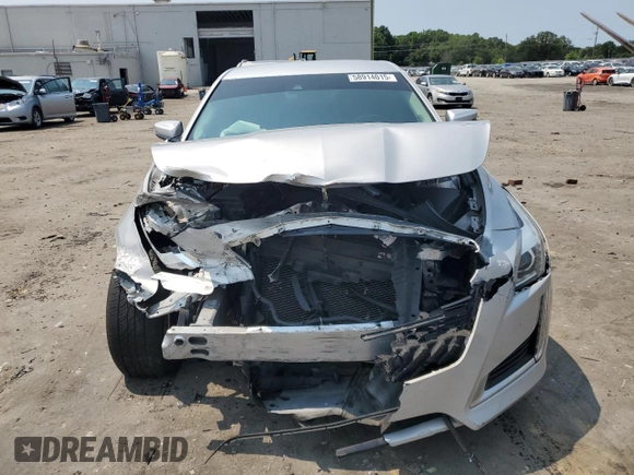 2014 Cadillac CTS Luxury AWD with VIN 1G6AX5SX5E0129143, listed as a Copart auction lot 58914015 with 131,465 mi miles and Salvage title. Bid and sale history available at DreamBid. Image 5.