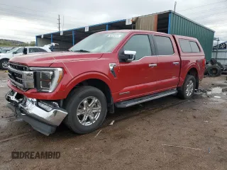 2021 Ford F-150 XL with VIN 1FTFW1ED7MFB28328, listed as a Copart auction lot 56223375 with 60,815 mi miles and Salvage title. Bid and sale history available at DreamBid. Image 1.