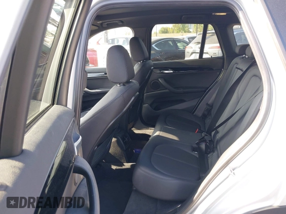 2019 BMW X1 xDrive28i with VIN WBXHT3C56K5L38658, listed as a IAAI auction lot 42496734 with 49,373 mi miles and . Bid and sale history available at DreamBid. Image 8.