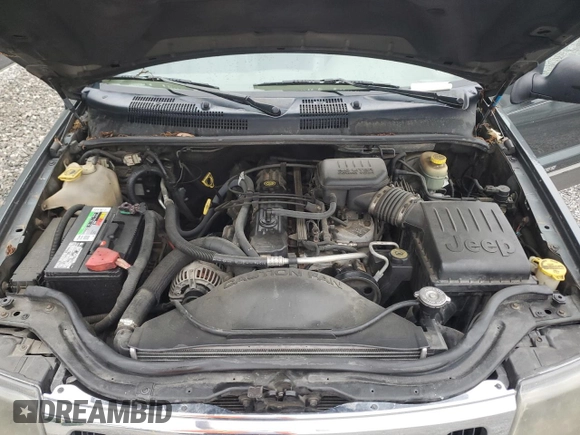 2002 Jeep Grand Cherokee z VIN 1J4GX38S72C152046, wystawiony jako Copart lot #57963095 z przebiegiem 204 576 mil mil oraz Szkoda całkowita • Salvage title. Historia ofert i sprzedaży dostępna na DreamBid. Obrazek 12.