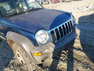 2004 Jeep Liberty Sport with VIN 1J4GK48K24W116576, listed as a IAAI auction lot 41461013 with 233,734 mi miles and . Bid and sale history available at DreamBid. Image 14.