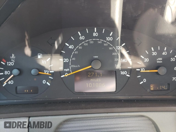 2001 Mercedes-Benz E-Class with VIN WDBJF65J01B325792, listed as a Copart auction lot 76328704 with 101,886 mi miles and Salvage Title. Bid and sale history available at carsss.com. Image 9.