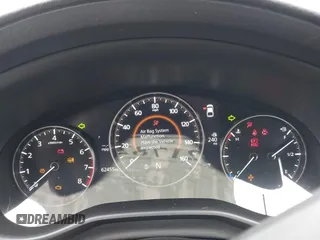 2021 Mazda 3 Premium z VIN JM1BPAML1M1318708, wystawiony jako IAAI lot #42178243 z przebiegiem 62 455 mil mil oraz . Historia ofert i sprzedaży dostępna na DreamBid. Obrazek 7.