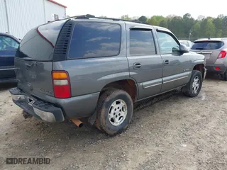 2002 Chevrolet Tahoe LT with VIN 1GNEK13Z42J203185, listed as a IAAI auction lot 41940552 with 325,618 mi miles. Bid and sale history available at carsss.com. Image 4.