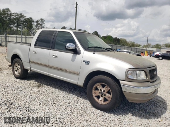 2002 Ford F-150 XLT with VIN 1FTRW07L12KA11845, listed as a Copart auction lot 51987205 with 282,865 mi miles and Salvage Title. Bid and sale history available at carsss.com. Image 4.