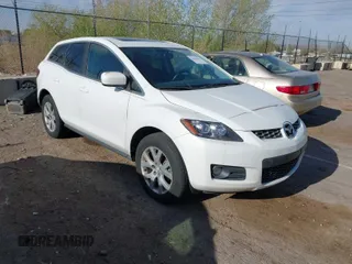 2009 Mazda CX-7 Sport with VIN JM3ER293390218961, listed as a IAAI auction lot 42030907 with 193,573 mi miles. Bid and sale history available at carsss.com. Image 1.