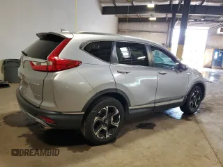 2018 Honda CR-V Touring z VIN 7FARW2H95JE012947, wystawiony jako Copart lot #64779925 z przebiegiem 20 561 mil mil oraz Szkoda całkowita • Salvage title. Historia ofert i sprzedaży dostępna na DreamBid. Obrazek 3.