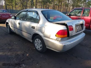 1996 Honda Civic LX "O" w/Air with VIN 2HGEJ6675TH506726, listed as a IAAI auction lot 41502910 with 250,045 mi miles. Bid and sale history available at carsss.com. Image 3.