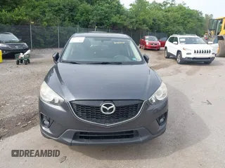 2014 Mazda CX-5 Touring z VIN JM3KE4CY2E0348500, wystawiony jako IAAI lot #42318155 z przebiegiem 182 616 mil mil oraz . Historia ofert i sprzedaży dostępna na DreamBid. Obrazek 12.