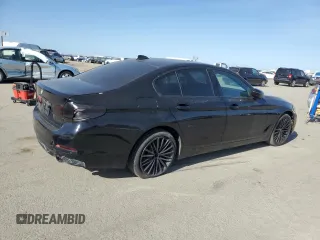 2018 BMW 5 Series 530e with VIN WBAJA9C5XJB249650, listed as a Copart auction lot 52633865 with 111,548 mi miles and Clean title. Bid and sale history available at DreamBid. Image 3.