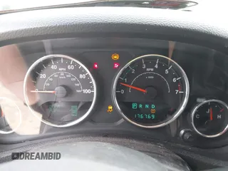 2014 Jeep Wrangler Unlimited Sahara with VIN 1C4HJWEG8EL292835, listed as a IAAI auction lot 42705672 with 176,769 mi miles and . Bid and sale history available at DreamBid. Image 7.