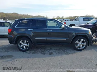 2011 Jeep Grand Cherokee Limited with VIN 1J4RR5GG4BC624876, listed as a IAAI auction lot 41877272 with 166,810 mi miles. Bid and sale history available at carsss.com. Image 13.