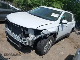 2020 Chevrolet Traverse LT Cloth z VIN 1GNERGKW1LJ123026, wystawiony jako IAAI lot #42289724 z przebiegiem 95 065 mil mil oraz . Historia ofert i sprzedaży dostępna na DreamBid. Obrazek 2.