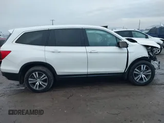 2017 Honda Pilot EX-L z VIN 5FNYF6H64HB084561, wystawiony jako IAAI lot #41158978 z przebiegiem 75 820 mil mil oraz . Historia ofert i sprzedaży dostępna na DreamBid. Obrazek 13.