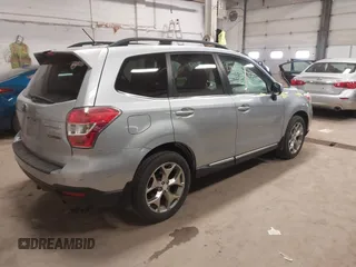 2015 Subaru Forester Touring with VIN JF2SJAWC3FH491026, listed as a IAAI auction lot 41977066 with 179,016 mi miles and . Bid and sale history available at DreamBid. Image 4.