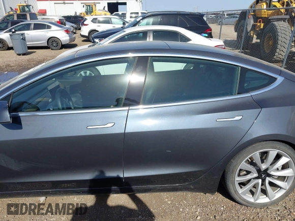 2020 Tesla Model 3 Long Range with VIN 5YJ3E1EB6LF666624, listed as a IAAI auction lot 41720664 with 65,973 mi miles. Bid and sale history available at carsss.com. Image 14.