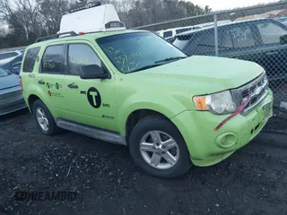 2009 Ford Escape Hybrid with VIN 1FMCU49319KB56650, listed as a IAAI auction lot 41490370 with 999,999 mi miles. Bid and sale history available at carsss.com. Image 1.