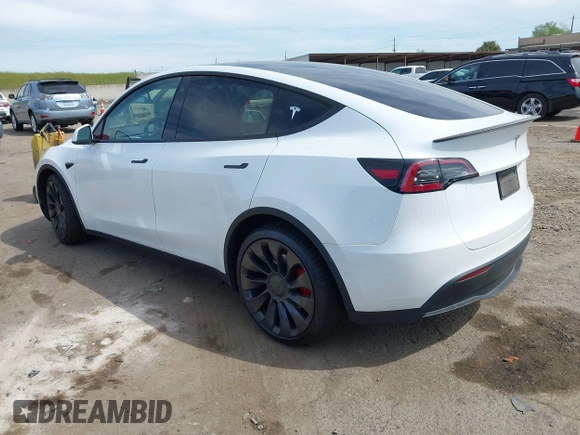 2021 Tesla Model Y Performance z VIN 5YJYGDEF7MF277769, wystawiony jako IAAI lot #42025157 z przebiegiem 28 522 mil mil oraz . Historia ofert i sprzedaży dostępna na DreamBid. Obrazek 3.