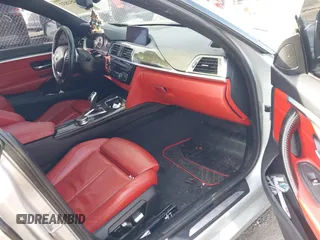 2018 BMW 4 Series 430i with VIN WBA4J1C56JBG80262, listed as a IAAI auction lot 41451833 with 148,487 mi miles and . Bid and sale history available at carsss.com. Image 5.