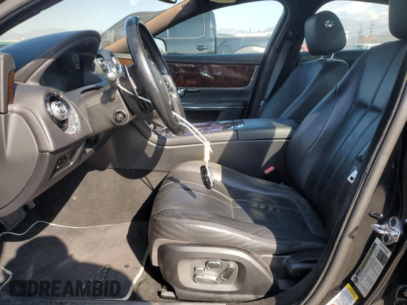 2011 Jaguar XJ with VIN SAJWA1CB4BLV05830, listed as a Copart auction lot 43007345 with 72,933 mi miles and Salvage title. Bid and sale history available at DreamBid. Image 7.