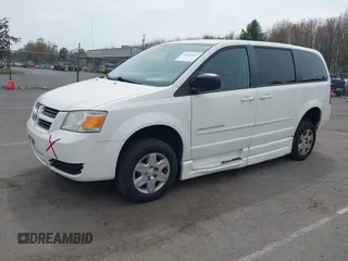 2010 Dodge Grand Caravan SE with VIN 2D4RN4DE0AR296590, listed as a IAAI auction lot 42133404 with 108,604 mi miles and . Bid and sale history available at DreamBid. Image 2.