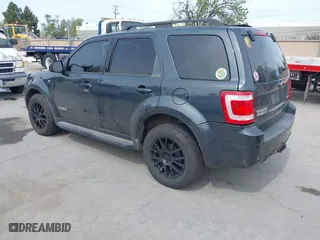 2008 Ford Escape Limited with VIN 1FMCU941X8KB76123, listed as a IAAI auction lot 41990383 with 201,515 mi miles. Bid and sale history available at carsss.com. Image 3.
