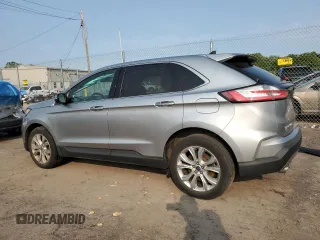 2021 Ford Edge Titanium with VIN 2FMPK4K91MBA12380, listed as a Copart auction lot 59275785 with 82,295 mi miles and Salvage title. Bid and sale history available at DreamBid. Image 2.