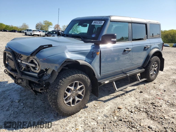 2023 Ford Bronco with VIN 1FMEE5DH2PLB00979, listed as a Copart auction lot 56652305 with 31,653 mi miles and Salvage title. Bid and sale history available at DreamBid. Image 1.