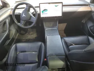 2021 Tesla Model 3 Standard Range Plus z VIN 5YJ3E1EA0MF089307, wystawiony jako Copart lot #50575465 z przebiegiem 131 251 mil mil oraz Szkody całkowita. Historia ofert i sprzedaży dostępna na DreamBid. Obrazek 8.