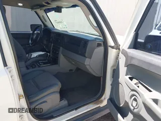 2007 Jeep Commander Sport with VIN 1J8HG48P97C601058, listed as a IAAI auction lot 42489447 with 200,103 mi miles and . Bid and sale history available at DreamBid. Image 5.