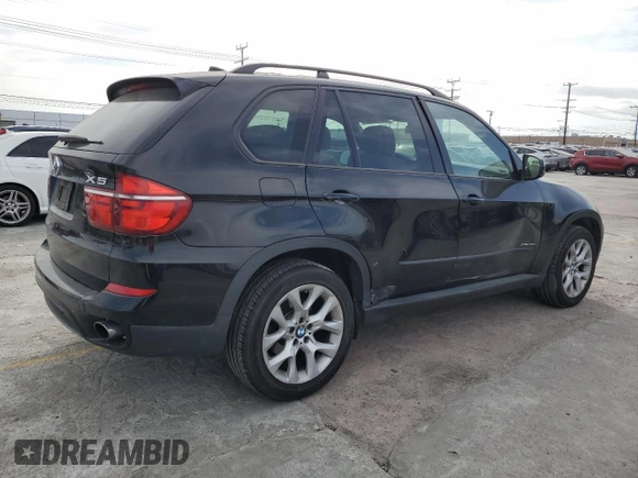 2012 BMW X5 35i z VIN 5UXZV4C51CL989449, wystawiony jako Copart lot #56762095 z przebiegiem 112 576 mil mil oraz Szkoda całkowita • Salvage title. Historia ofert i sprzedaży dostępna na DreamBid. Obrazek 3.