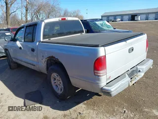2001 Dodge Dakota Sport with VIN 1B7HL2AN51S310862, listed as a IAAI auction lot 41436565 with 152,425 mi miles. Bid and sale history available at carsss.com. Image 3.