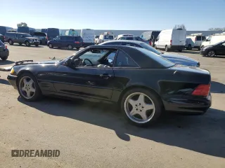 1999 Mercedes-Benz SL-Class with VIN WDBFA68F0XF187331, listed as a Copart auction lot 42855015 with 0 mi miles and Salvage Title. Bid and sale history available at carsss.com. Image 2.