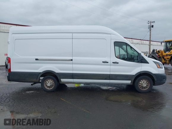 2023 Ford Transit Cargo with VIN 1FTBR3U89PKA09391, listed as a IAAI auction lot 41993662 with 36,147 mi miles and . Bid and sale history available at DreamBid. Image 13.