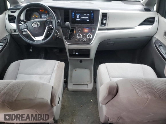 2017 Toyota Sienna L with VIN 5TDZZ3DC7HS900115, listed as a Copart auction lot 44694995 with 80,798 mi miles and Salvage Title. Bid and sale history available at DreamBid. Image 8.