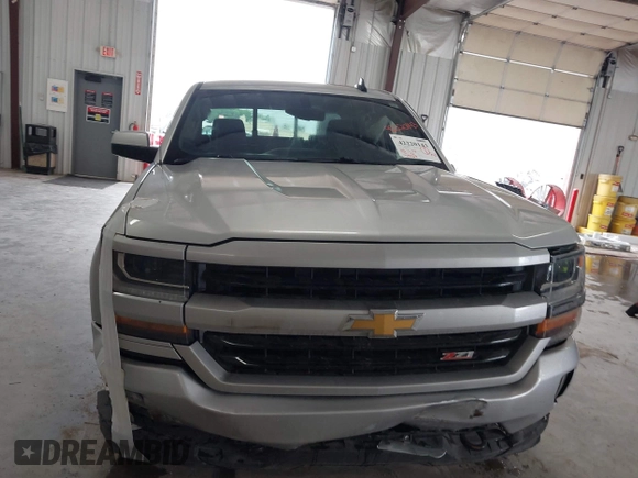 2017 Chevrolet Silverado 1500 LT with VIN 3GCUKREC2HG473554, listed as a IAAI auction lot 42220143 with 80,000 mi miles and . Bid and sale history available at DreamBid. Image 12.