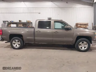 2015 Chevrolet Silverado 1500 LT with VIN 3GCUKREC5FG207488, listed as a IAAI auction lot 41472511 with 167,448 mi miles. Bid and sale history available at carsss.com. Image 13.