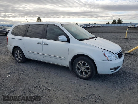 2014 Kia Sedona EX with VIN KNDMH4C72E6579104, listed as a Copart auction lot 73343324 with 163,997 mi miles and Clean Title. Bid and sale history available at carsss.com. Image 4.