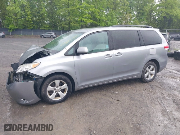 2012 Toyota Sienna LE AAS with VIN 5TDKK3DC8CS227401, listed as a IAAI auction lot 39425988 with 165,982 mi miles. Bid and sale history available at carsss.com. Image 2.