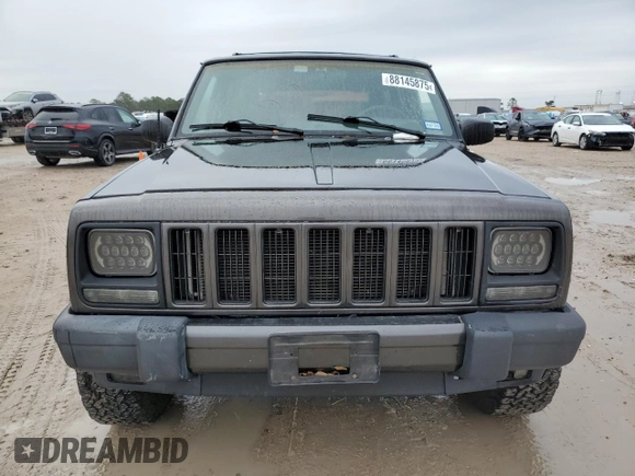 1999 Jeep Cherokee Sport with VIN 1J4FT68S2XL656679, listed as a Copart auction lot 88145875 with 254,038 mi miles and Salvage title. Bid and sale history available at DreamBid. Image 5.