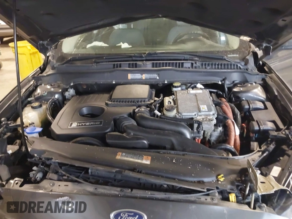 2015 Ford Fusion S Hybrid with VIN 3FA6P0UU8FR178675, listed as a IAAI auction lot 42104712 with 129,998 mi miles. Bid and sale history available at carsss.com. Image 10.