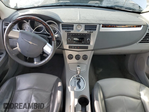 2007 Chrysler Sebring Limited z VIN 1C3LC66K07N548825, wystawiony jako Copart lot #45142015 z przebiegiem 240 543 mil mil oraz Szkoda całkowita • Salvage title. Historia ofert i sprzedaży dostępna na DreamBid. Obrazek 8.