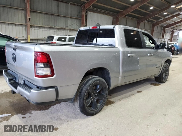 2021 Ram 1500 Big Horn z VIN 1C6RREFT7MN708516, wystawiony jako Copart lot #57719405 z przebiegiem 65 000 mil mil oraz Szkoda całkowita • Salvage title. Historia ofert i sprzedaży dostępna na DreamBid. Obrazek 3.