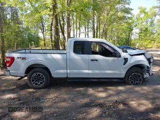 2023 Ford F-150 XL with VIN 1FTEX1EP8PFA78448, listed as a IAAI auction lot 42115100 with 31,433 mi miles and . Bid and sale history available at DreamBid. Image 14.