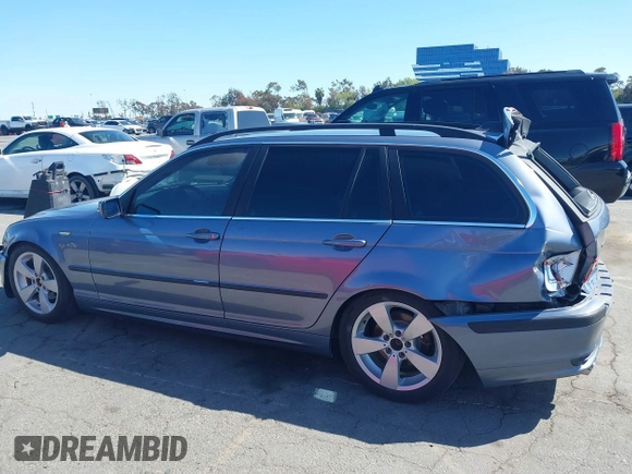 2003 BMW 3 Series 325i with VIN WBAEN33443PC11690, listed as a IAAI auction lot 41939082 with 159,123 mi miles. Bid and sale history available at carsss.com. Image 14.